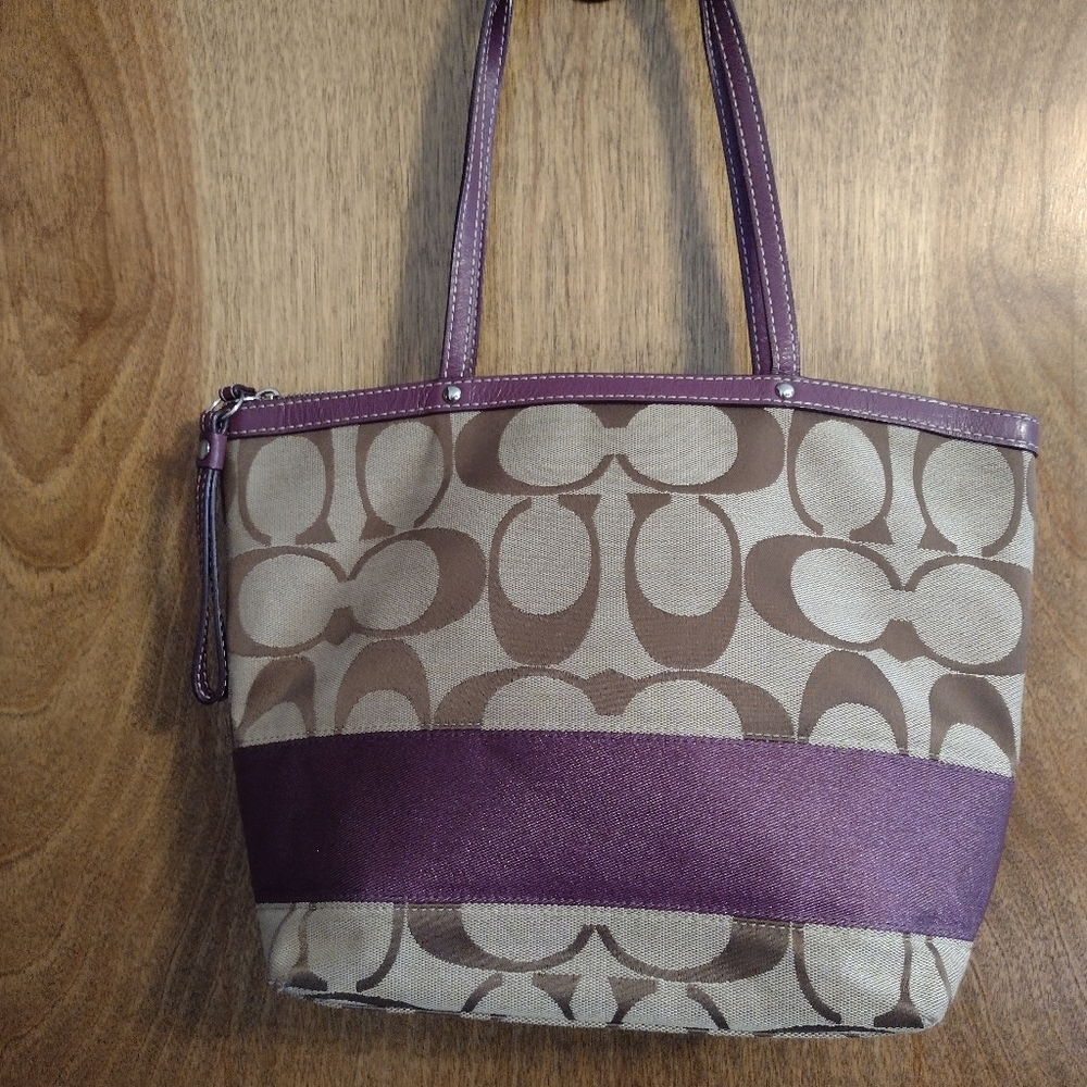 vintage Coach handbag with matching wallet.